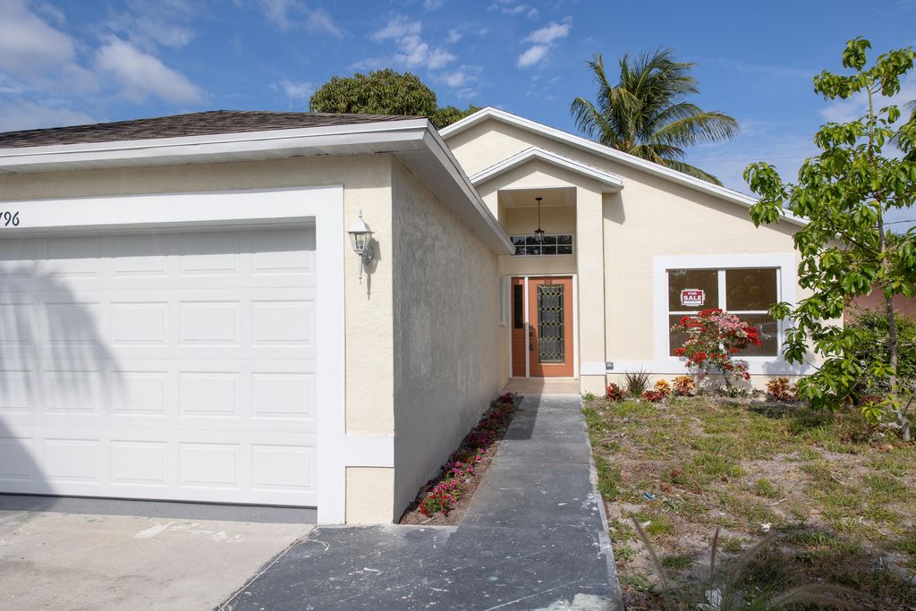 Photo of 5796 SE Collins Avenue, Stuart, FL 34997 (MLS # R10977201)