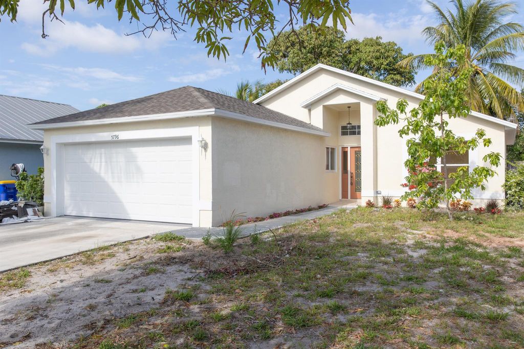 Photo of 5796 SE Collins Avenue, Stuart, FL 34997 (MLS # R10977201)