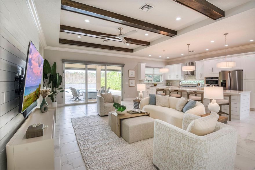 Located in one of the most desired locations within the resort-style gated community of Jupiter Country Club, this coveted extended Santangelo model sits on nearly 1/3 acre on an ultra-private lot with breathtaking views of the wide lake & tree-lined preserve with no other homes in the rear. **RARE INTERMEDIATE golf membership is grandfathered with this home.** This membership level is no longer available and there is currently a waitlist for golf memberships. (Buyer could also downgrade to social/club membership). Absolutely stunning finishes run throughout the home including porcelain tile flooring, quartz countertops, crown molding, plantation shutters, stylish light fixtures & ceiling fans. This spacious floor plan offers 5 bedrooms (or 4 bedrooms + a den/office), 3 1/2 baths PLUS a