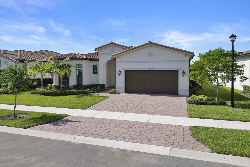 Photo of 7911 Rowan Ter, Parkland, FL 33067 (MLS # F10536790)