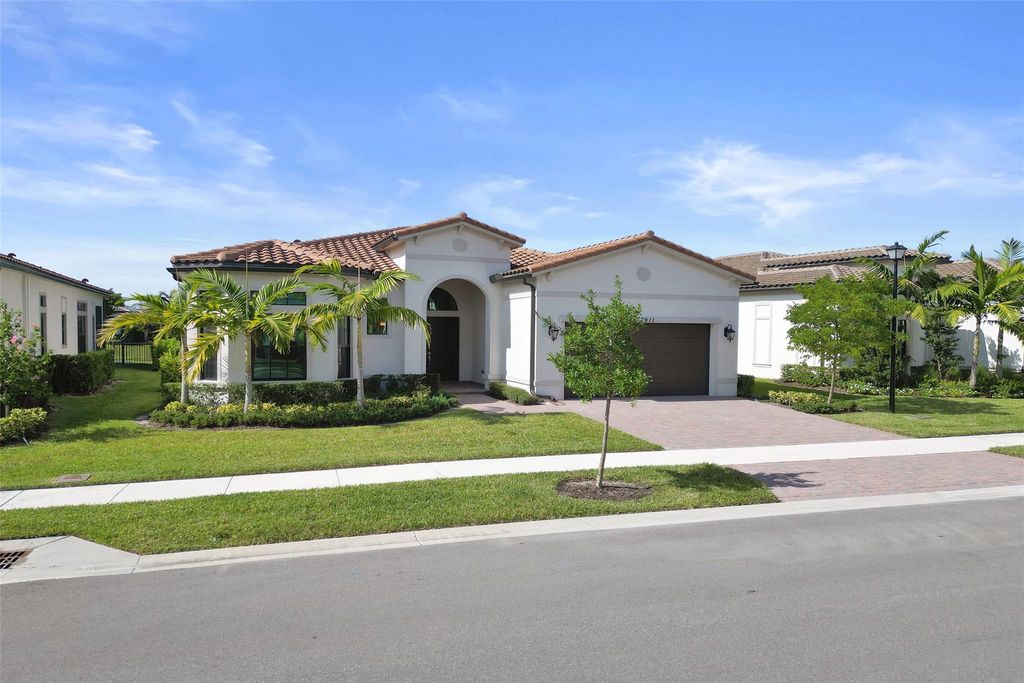 Photo of 7911 Rowan Ter, Parkland, FL 33067 (MLS # F10536790)
