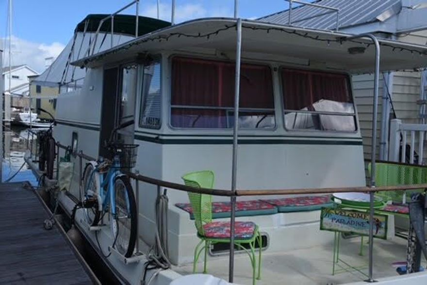 Very nice well maintained 34' Trojan Houseboat located in Central Key West.
All fiberglass, very dry.  Very efficient design  with plenty of storage.  Walk around bed in master stateroom.  Two twin size bunks in the lower berth for guests.  Standard head with shower and vanity.  Galley and Salon area.  Front and rear decks at the main level with a nice sized mid-deck and a great upper deck for sunning, star gazing, or just enjoying a nice breeze on a warm Key West evening.  Many extras included, move-in ready, just bring your toothbrush. Low monthly slip fee of just $680 per month includes free pump out, 2 very clean laundry and shower facilities, patrolled security, PLUS 2 off street parking passes.