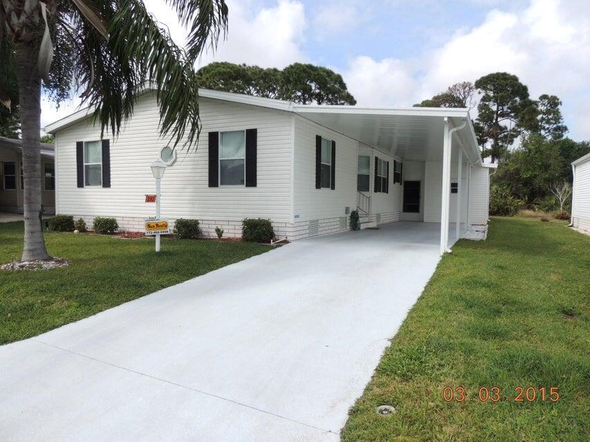 Beautiful home with dry wall. You will be pleasantly surprised as you walk into this fine 2 bedroom, 2 bath home with nice Florida room and home backs to preserve area. Leased Land of $586 which includes HOA fee of $260 month. Call today!!