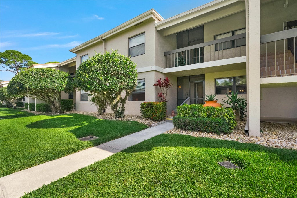 Photo of 13403 Touchstone Place #A-105, Palm Beach Gardens, FL 33418 (MLS # R10979019)