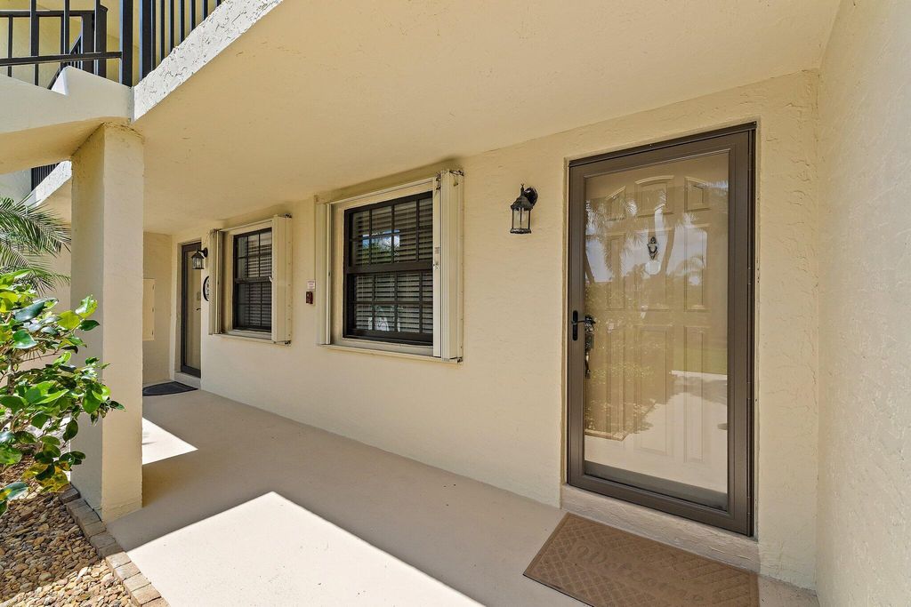 Photo of 401 Pinecrest Circle #F, Jupiter, FL 33458 (MLS # B26023171)