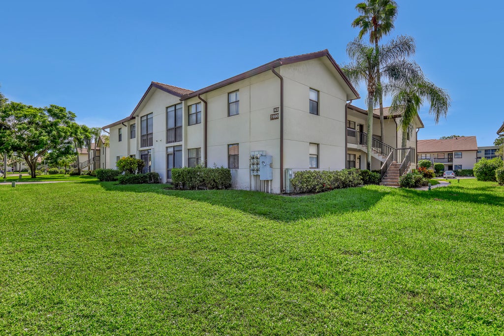 Photo of 7690 Tahiti Lane #202, Lake Worth, FL 33467 (MLS # B26077281)