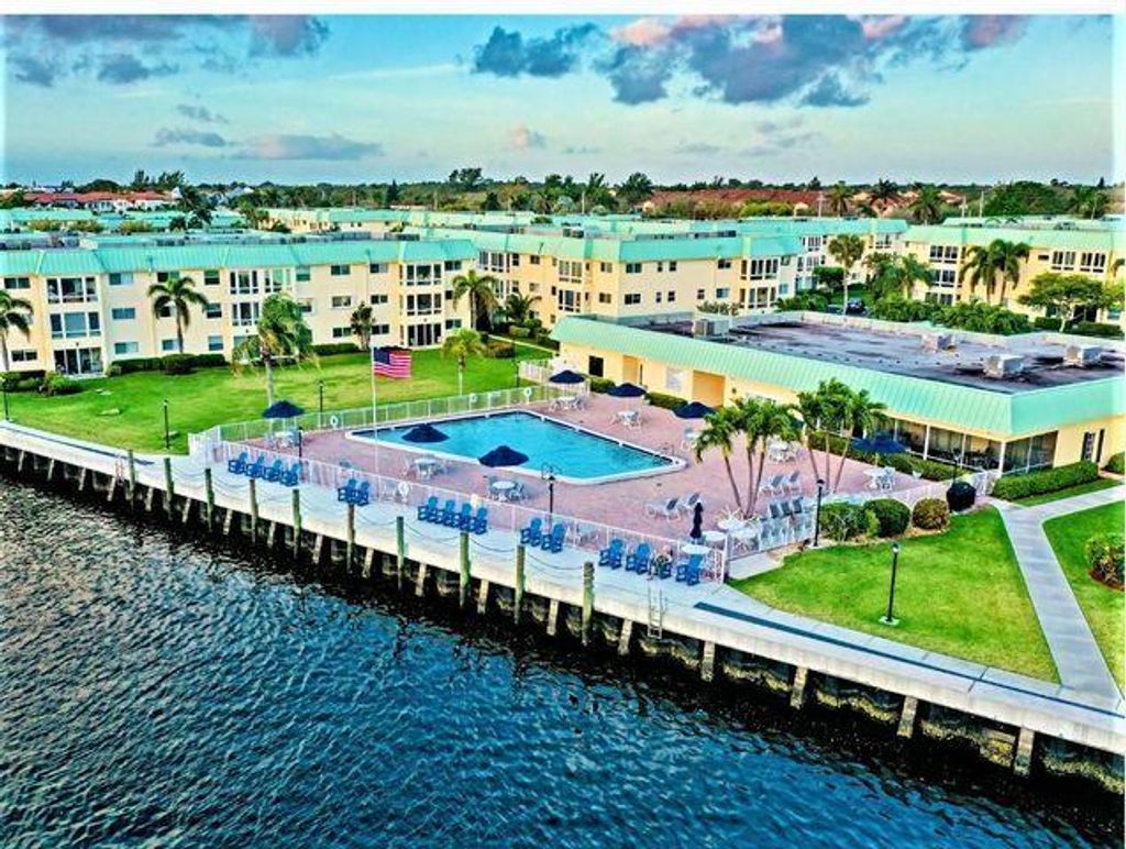 Photo of 10 Colonial Club Drive #101, Boynton Beach, FL 33435 (MLS # R10979642)