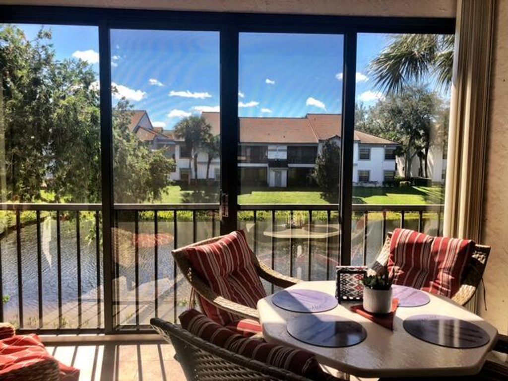 Photo of 5290 Europa Drive #G, Boynton Beach, FL 33437 (MLS # R11096740)