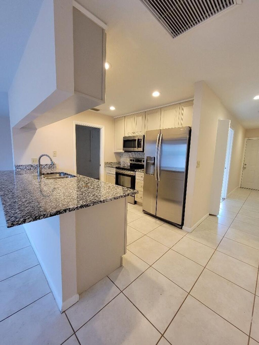 Photo of 1087 Goldenrod Road, Wellington, FL 33414 (MLS # B26042618)