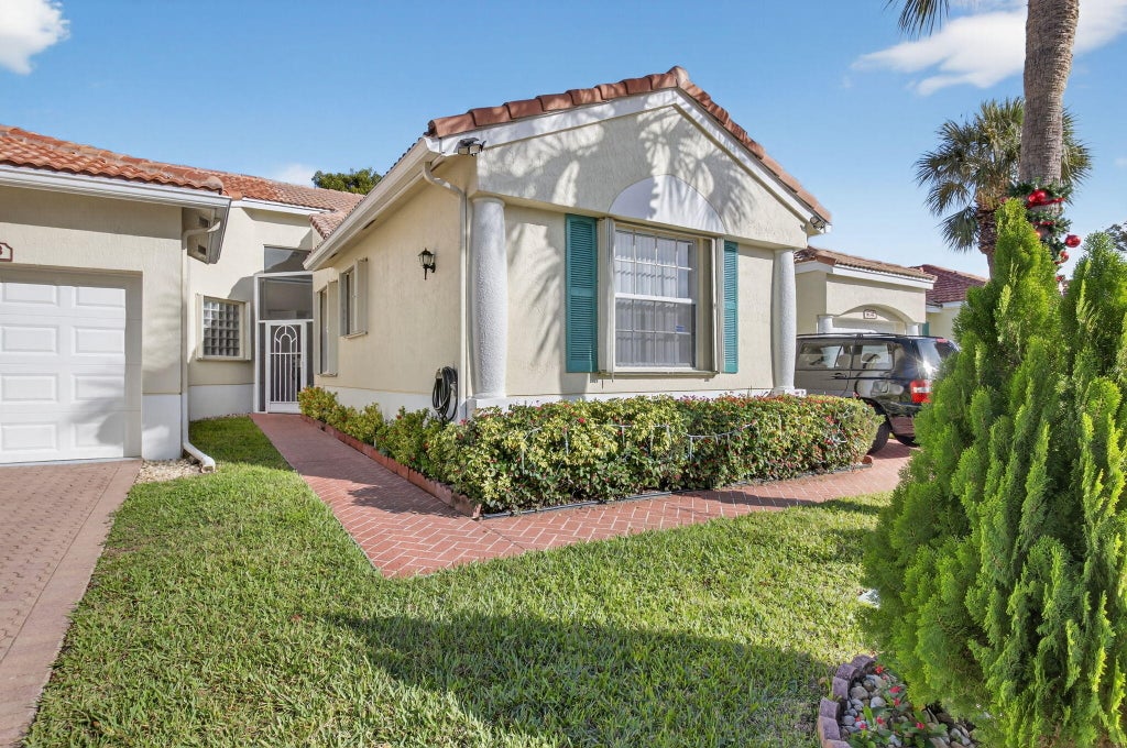 Photo of 6247 Heliconia Road, Delray Beach, FL 33484 (MLS # R11147471)