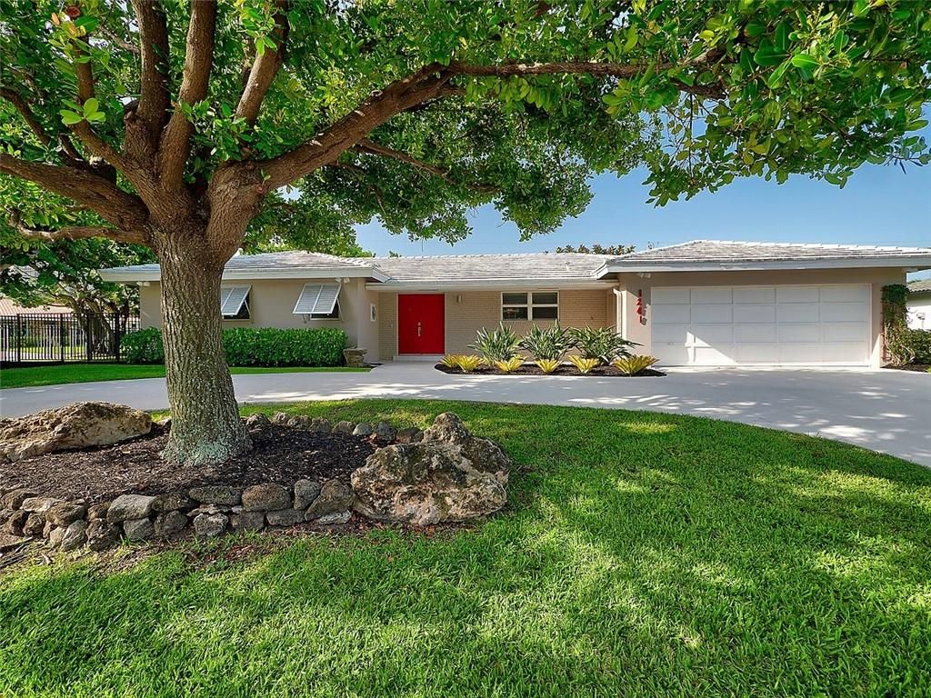 Photo of 1241 Dolphin Rd, Riviera Beach, FL 33404 (MLS # F10295303)