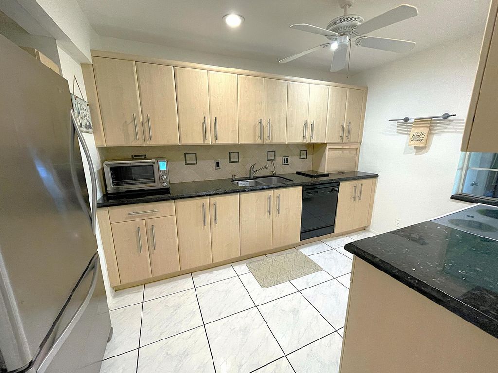 Photo of 2431 Del Aire Boulevard #115-d, Delray Beach, FL 33445 (MLS # B26028699)