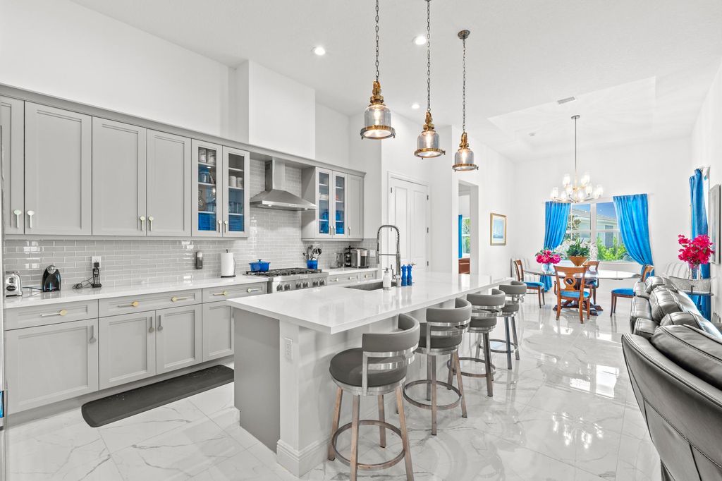 Photo of 10038 Regency Way, Palm Beach Gardens, FL 33412 (MLS # R10992074)