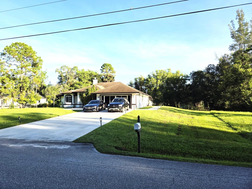Photo of 17149 W Alan Black Boulevard, The Acreage, FL 33470 (MLS # B26086524)