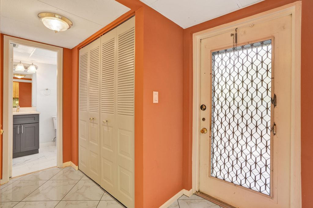 Photo of 1055 Country Club Drive #305, Margate, FL 33063 (MLS # B26004758)