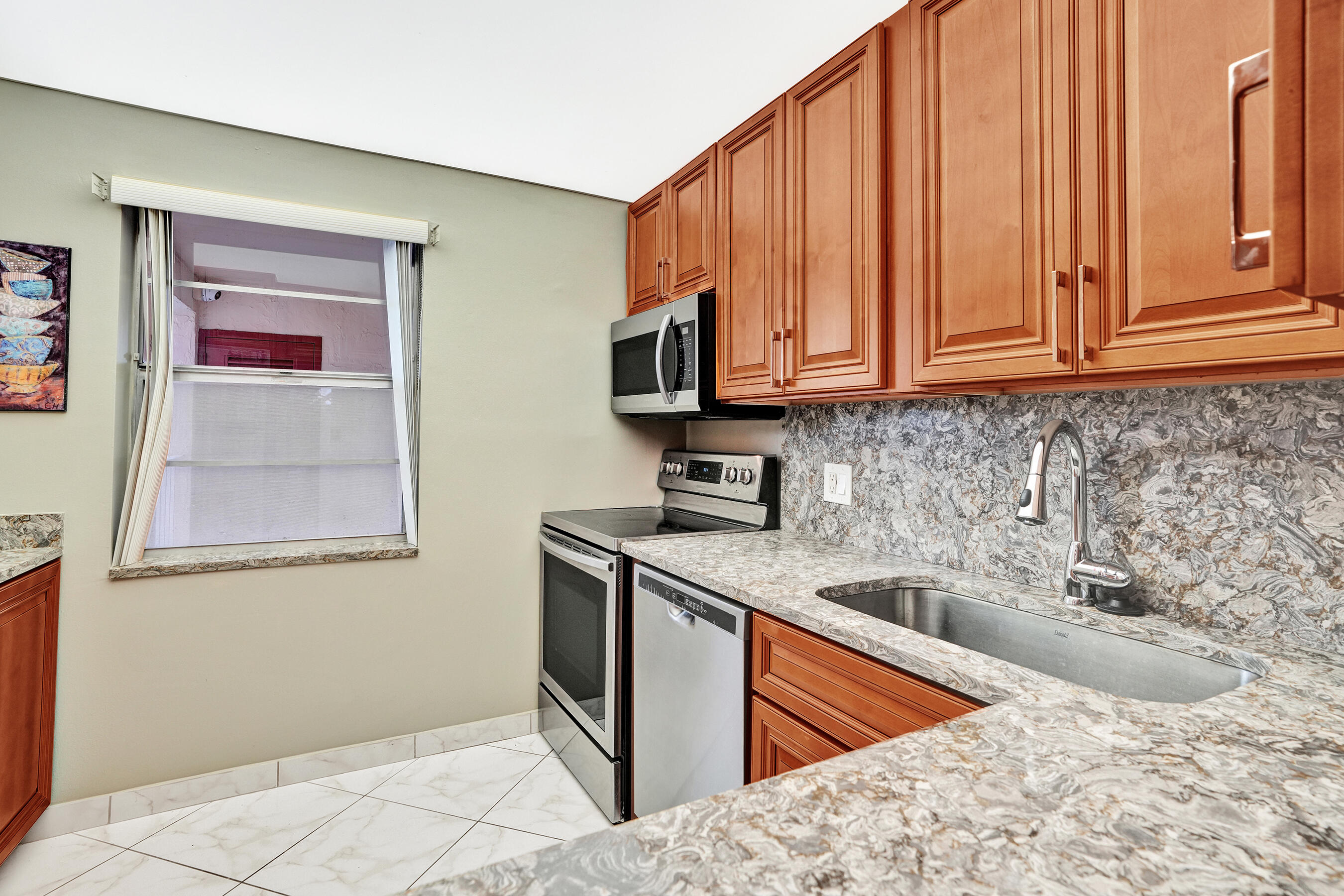 ORIOLE GOLF & TENNIS CLUB CONDO - Residential