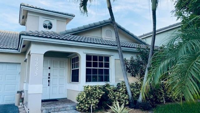 Photo of 4235 NW 56TH Drive, Coconut Creek, FL 33073 (MLS # B26061311)