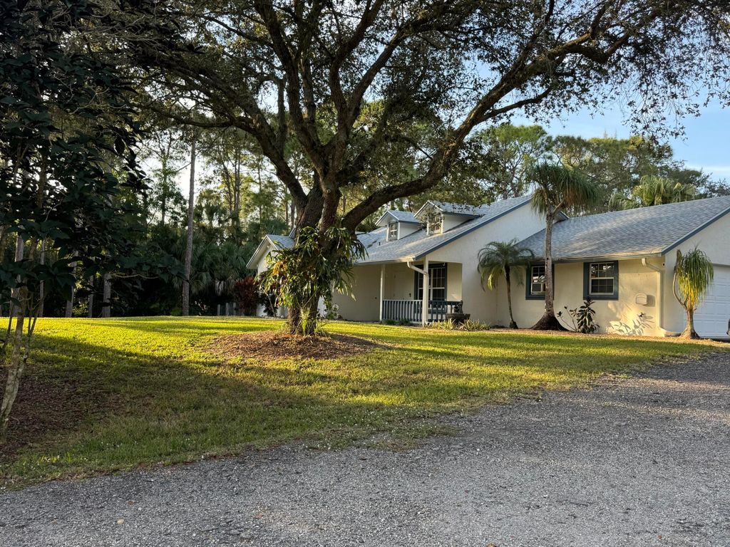 Photo of 12207 77th Place N, West Palm Beach, FL 33412 (MLS # R11150482)