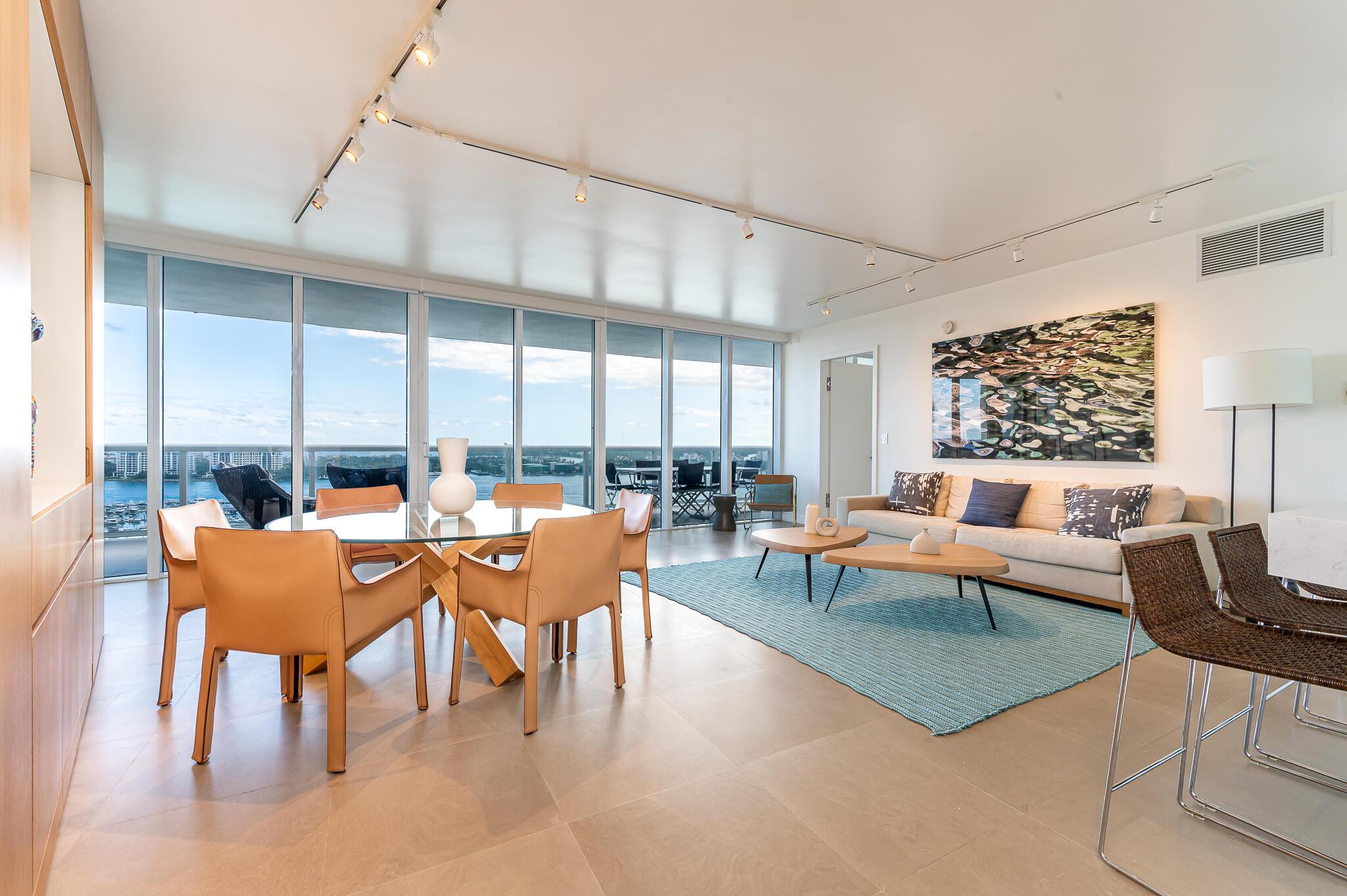 Best location in Miami Beach south of fifth!Luxury waterfront condo designed by famed Venezuelan architect & interior designer Alejandro Barrios-Carrero (known for his work at ''Juvia''' in Miami Beach),this SoFi 2-bedroom/2.5-bathroom modern home in the sky features a split bedroom plan.Prepare to be mesmerized by the breathtaking views of the intracoastal, ocean, bay and city. This fully remodeled bright residence feat. luxury designer finishes, abundant walk in closets, an open floor plan, & semi private elevator entrance. Home is being offered fully furnished! Murano Grande is luxury full service building- Miami Beach marina in your backyard to dock or charter boat, walk to all the best shops, restaurants, bars, workout class and the beach!