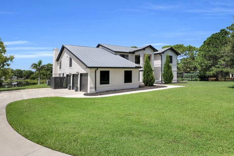 Photo of 9809 SW MALIBU Terrace, Palm City, FL 34990 (MLS # B26077151)