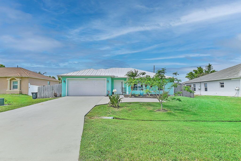 Photo of 1037 SW Romaine Lane, Port Saint Lucie, FL 34953 (MLS # R11099069)