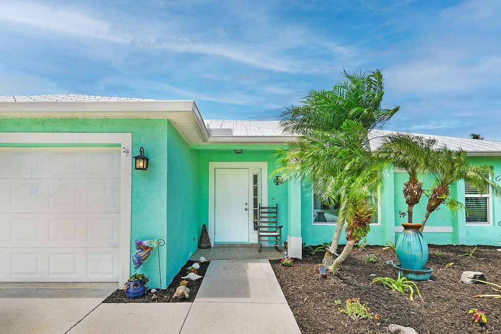 Photo of 1037 SW Romaine Lane, Port Saint Lucie, FL 34953 (MLS # R11099069)