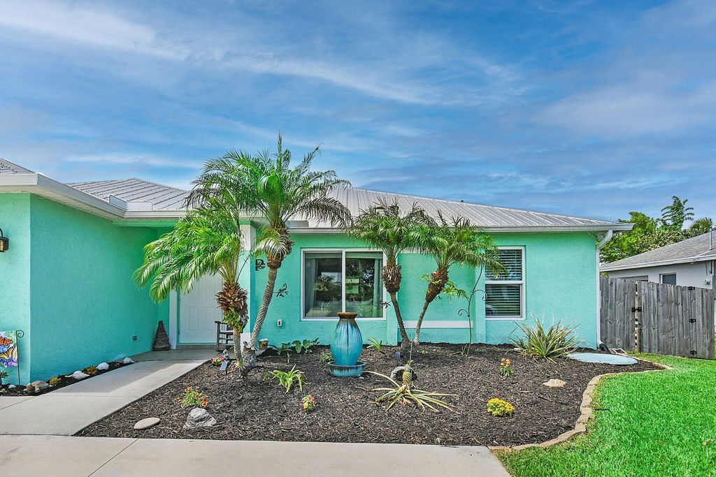 Photo of 1037 SW Romaine Lane, Port Saint Lucie, FL 34953 (MLS # R11099069)