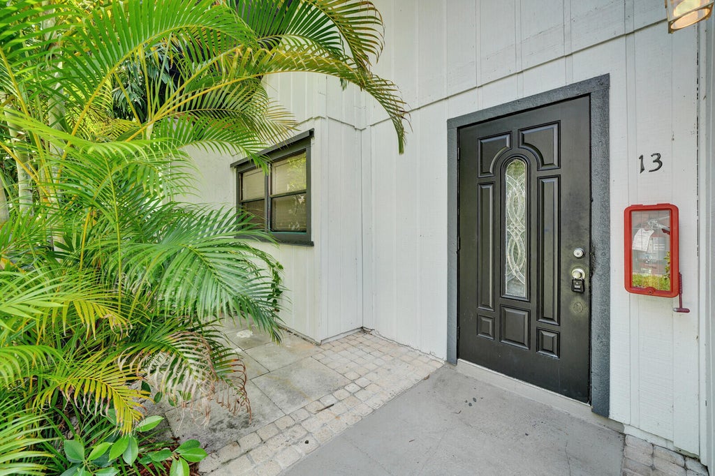 Photo of 100 Sparrow Drive #13, Royal Palm Beach, FL 33411 (MLS # B26057261)