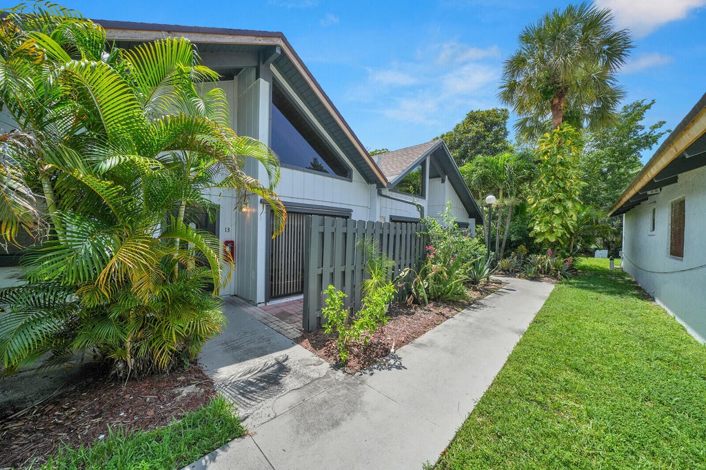 Photo of 100 Sparrow Drive #13, Royal Palm Beach, FL 33411 (MLS # B26057261)