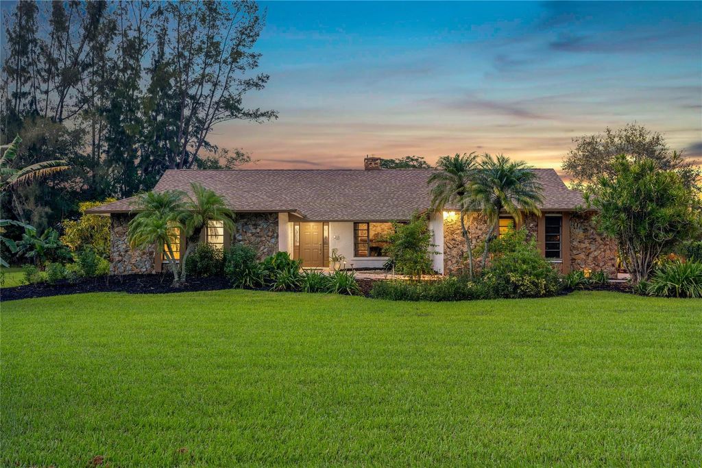 Photo of 11847 Green Oak Dr, Davie, FL 33330 (MLS # F10397208)