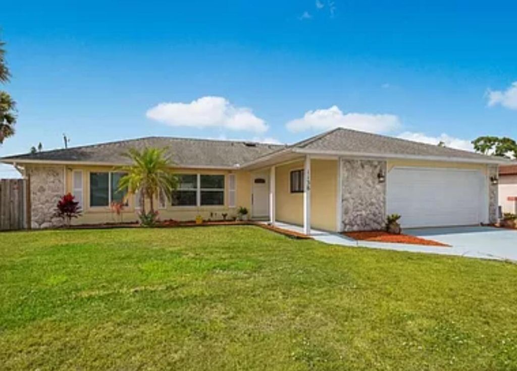 Photo of 1138 SW Gardena Avenue, Port Saint Lucie, FL 34953 (MLS # R10942524)