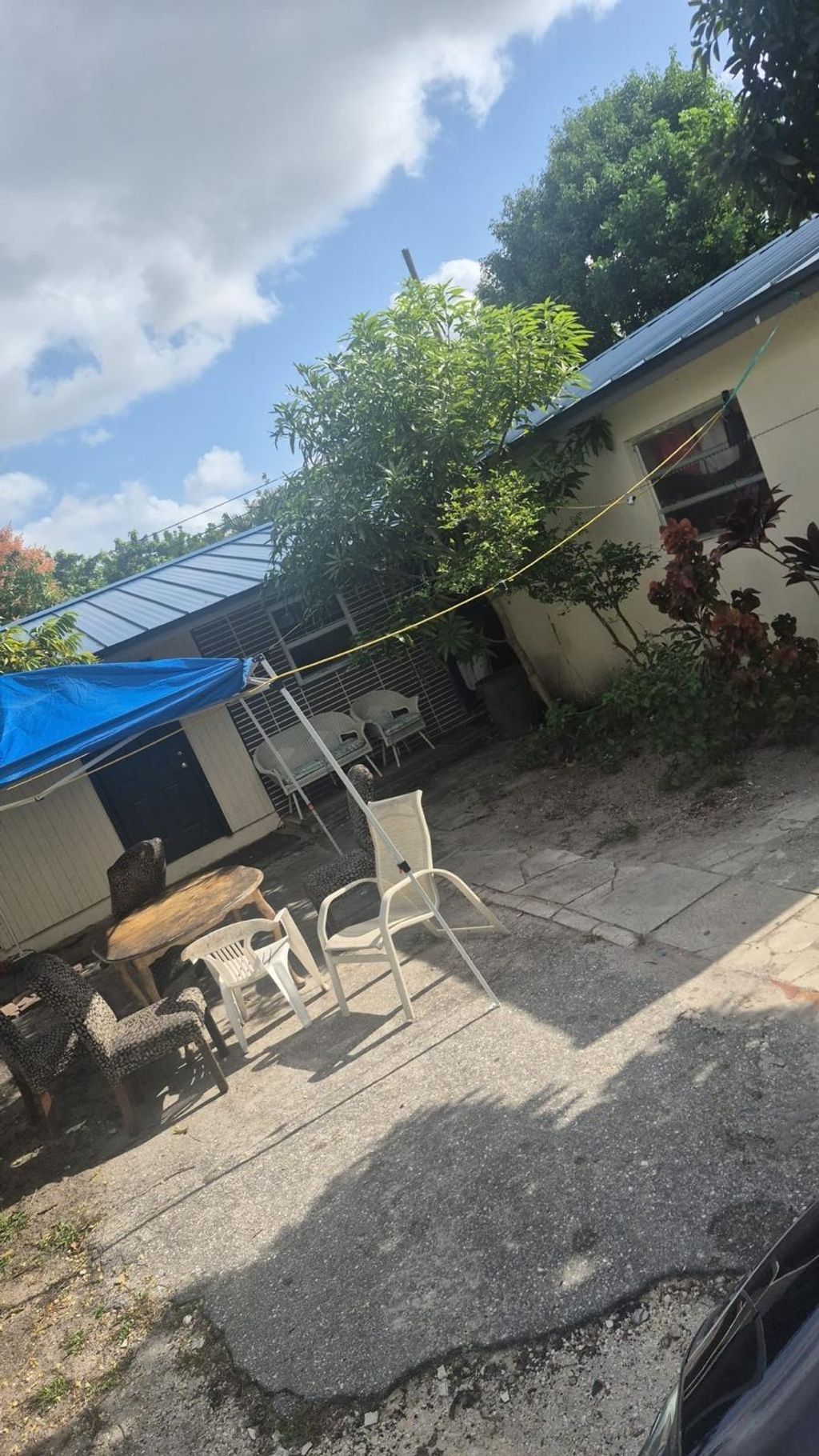 Photo of 554 Vossler Avenue, West Palm Beach, FL 33413 (MLS # B26017659)