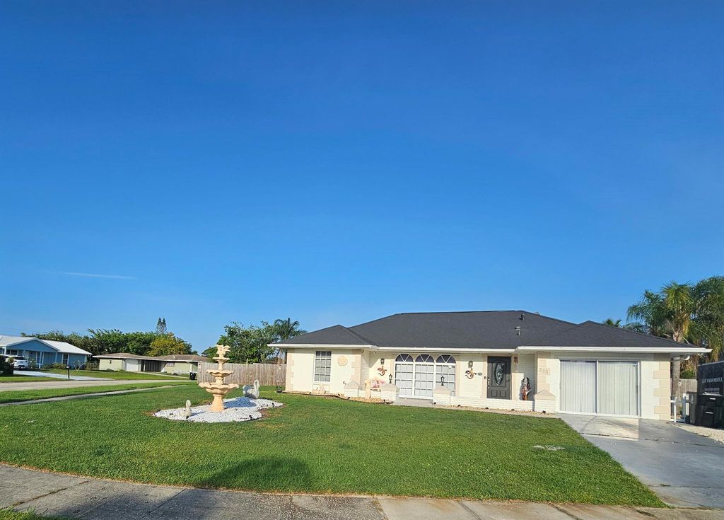 Photo of 333 NE Surrey Street, Port Saint Lucie, FL 34983 (MLS # R11092157)