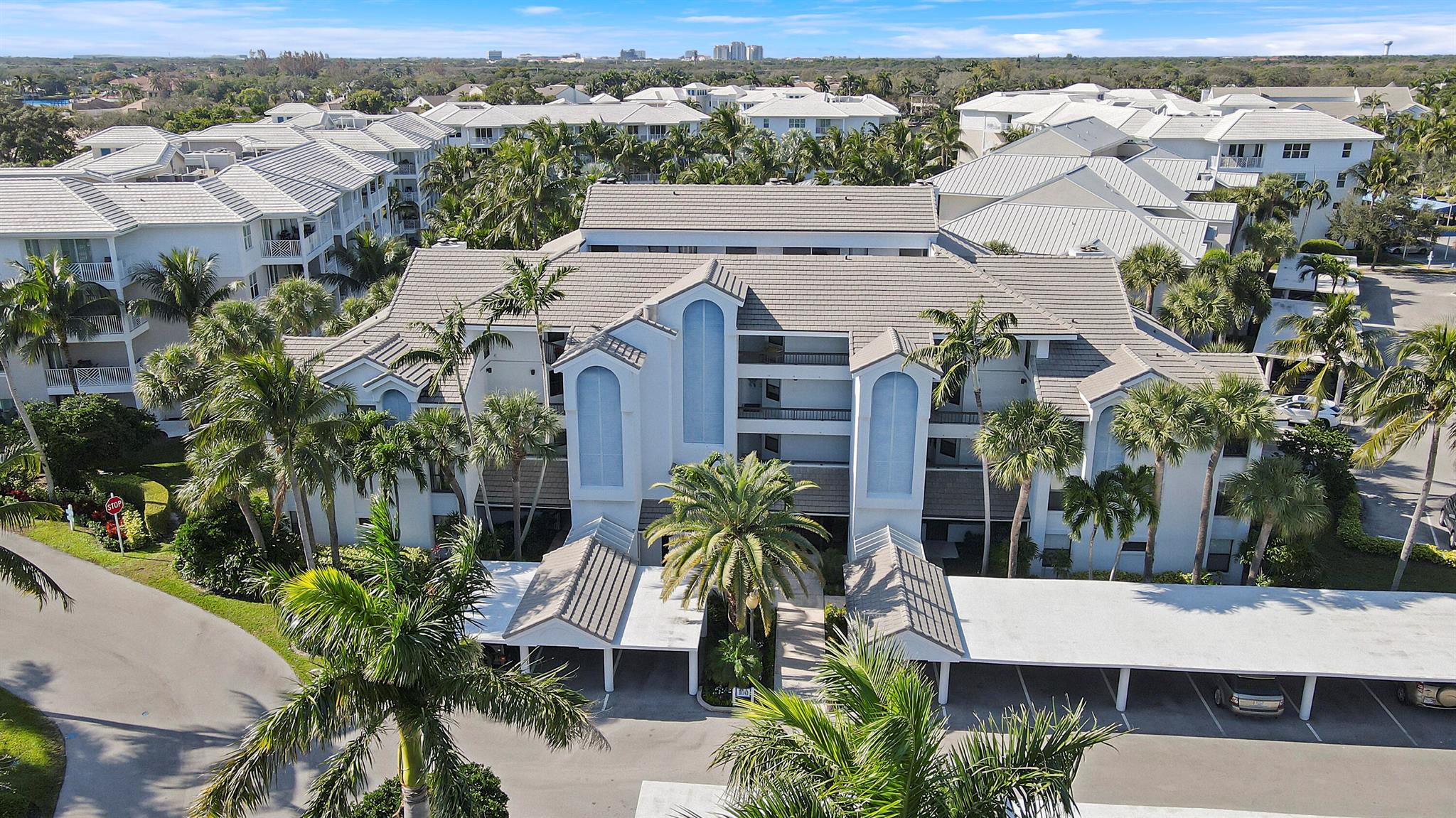 New Price. New AC System! Welcome to Bay Colony. This is a unique enclave of communities centered around a great pool and recreation facility with a marina on the intracoastal in Juno Beach. This property is only 1 of 6 two story loft condos. Facing west this unit features a great view of the pool with amazing sunsets from your 4th floor screened balcony. A large living/dining area features a real wood burning fireplace and picturesque views. The loft is unique and can also be used as a 3rd bedroom or office. Vaulted ceilings add to the spacious feeling of the unit. Minutes from all of the dining, shopping and entertainment on PGA Blvd. Juno Beach, Jupiter Beach, the Jupiter Inlet and all of the amenties in northern Palm Beach County are only minutes from your door