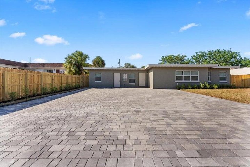 Photo of 829 Bayberry Drive #B, Lake Park, FL 33403 (MLS # R11145322)