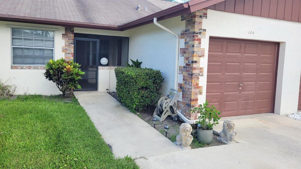 Photo of 104 Moccasin Trail S, Jupiter, FL 33458 (MLS # R11114595)