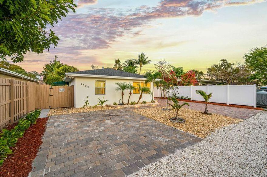 This is the front, west-facing unit of a duplex home. Available immediately.   Pool shared with another unit, only 1 Female Occupant on premises.   —Live minutes to Downtown FTL/Las Olas, Federal Hwy, and the beach in this updated 2BR/1BA duplex home with a private entrance, separate driveway with plenty of space, and a gated dog run—perfect for pet owners. Inside, enjoy custom built closets, new kitchen cabinetry, hurricane impact windows, a new roof, newer A/C, and in-unit washer/dryer. Step outside to a tropical backyard with a large pool, beautifully kept greenery, an area for a grill, Included is outdoor seating, lounge chairs, and a fire pit.  Standard/large dogs acceptable in compliance with pet policies and deposits.