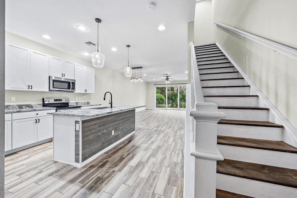 Photo of 575 SW Glen Crest Way, Stuart, FL 34997 (MLS # R10964444)