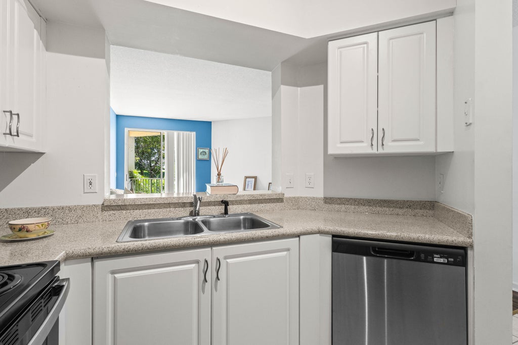 Photo of 1957 BRANDYWINE Road #207, West Palm Beach, FL 33409 (MLS # B26069598)