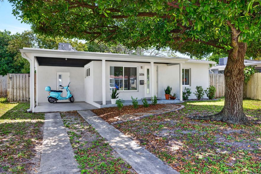 Set in NORTH ANDREWS TERRACE, this updated OAKLAND PARK HOME brings the kind of character you do not find in a basic box renovation. REFINISHED TERRAZZO FLOORS, IMPACT WINDOWS & DOORS, RECESSED LIGHTING, flat-finish walls and an open living area give the home a cool, preserved-era feel. The kitchen has a relaxed cottage feel with SUBWAY TILE BACKSPLASH, newer SS APPLIANCES, farm-style sink and an open view to the backyard. Both bedrooms continue the clean minimalist style, including SHAKER-STYLE DOORS. Remodeled bath with WALK-IN SHOWER featuring matte porcelain tile surround and pebble-style floor, vessel sink and Moen fixtures. INTERIOR LAUNDRY, 2023 HVAC, CARPORT, OVERSIZED FENCED YARD, mango tree and ROOM FOR A POOL. Easy access to WILTON MANORS, I-95, beach, Downtown FTL and AIRPORT.