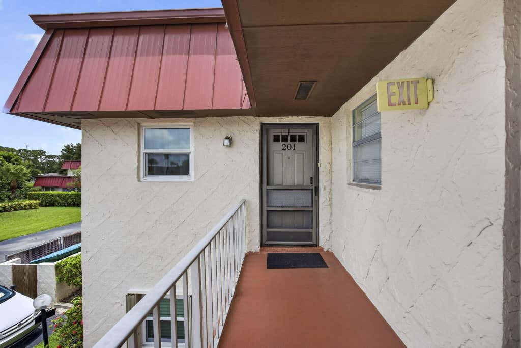 Photo of 12022 W Greenway Drive #201, Royal Palm Beach, FL 33411 (MLS # B26051975)