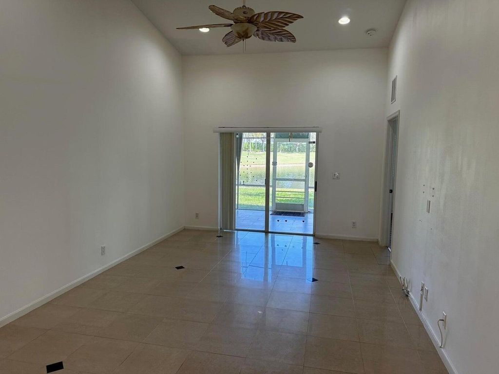 Photo of 9861 Galleon Drive, West Palm Beach, FL 33411 (MLS # R11167566)