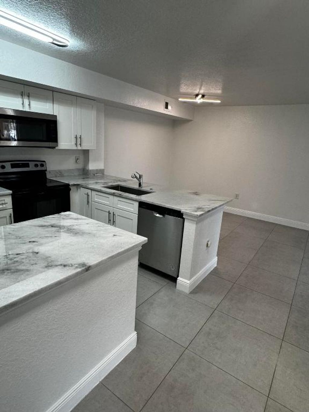 Photo of 191 SW Palm Drive #105, Port Saint Lucie, FL 34986 (MLS # R10996805)