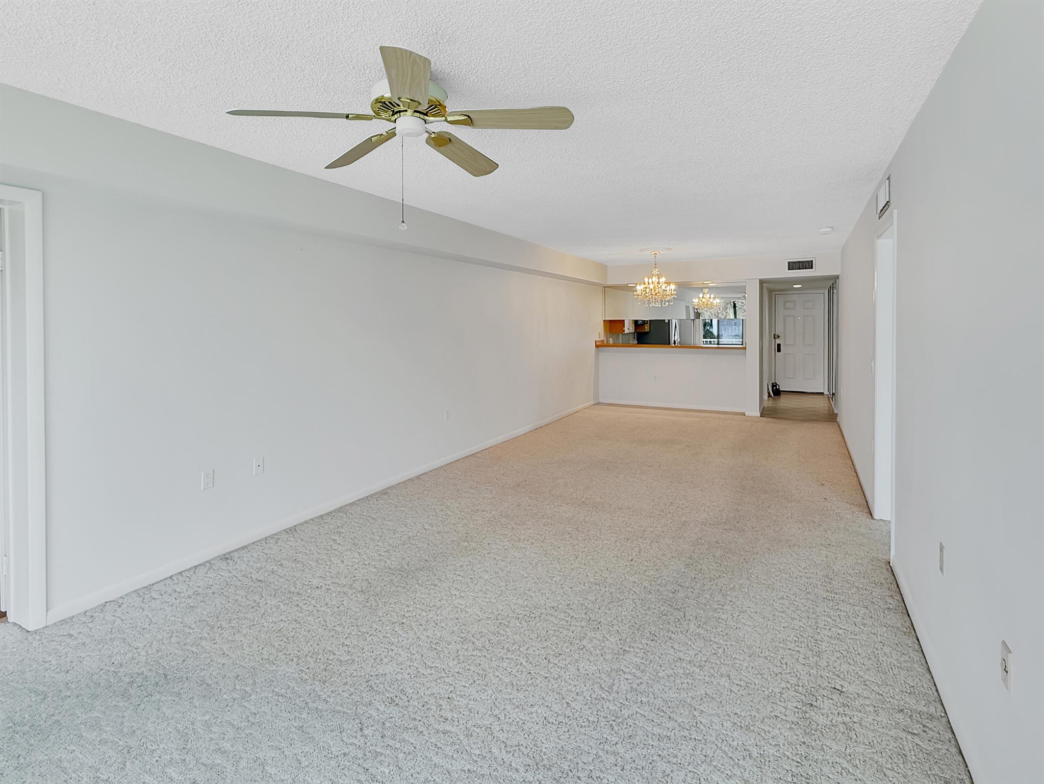 This spacious 2-bedroom, 2-bathroom condo offers 1,437 sq. ft. of comfortable living space on the 3rd floor, complete with serene views overlooking one of the community's four sparkling pools. The split-bedroom layout provides privacy and functionality, while the open living and dining areas create a bright and inviting atmosphere.Enjoy all the amenities of this resort-style community, including multiple pools, a fitness center, clubhouse, and tennis courts--all just minutes from shopping, dining, golf, downtown West Palm Beach, and the beaches.