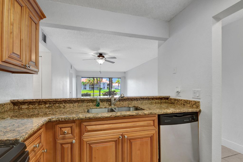 Photo of 1495 Lake Crystal Drive #B, West Palm Beach, FL 33411 (MLS # B26018341)