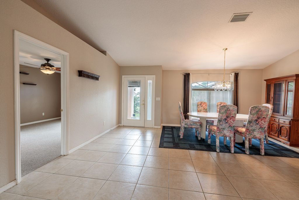Photo of 638 SW Mccullough Avenue, Port Saint Lucie, FL 34953 (MLS # R11117486)