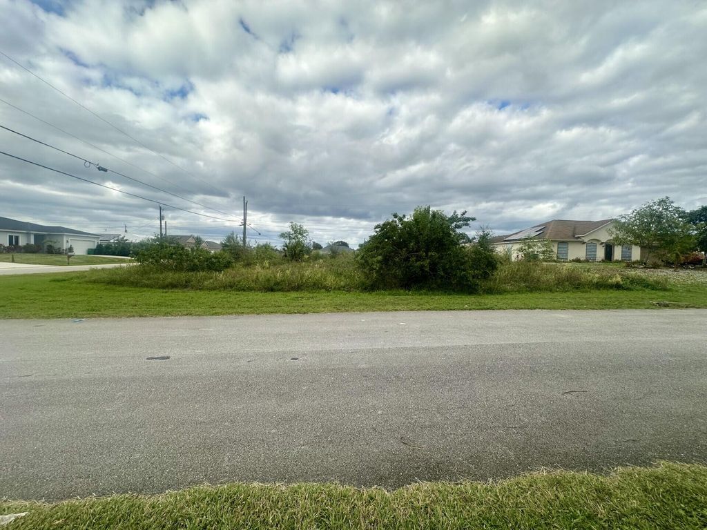 Photo of 689 SW Fair Avenue, Port Saint Lucie, FL 34953 (MLS # R11119804)