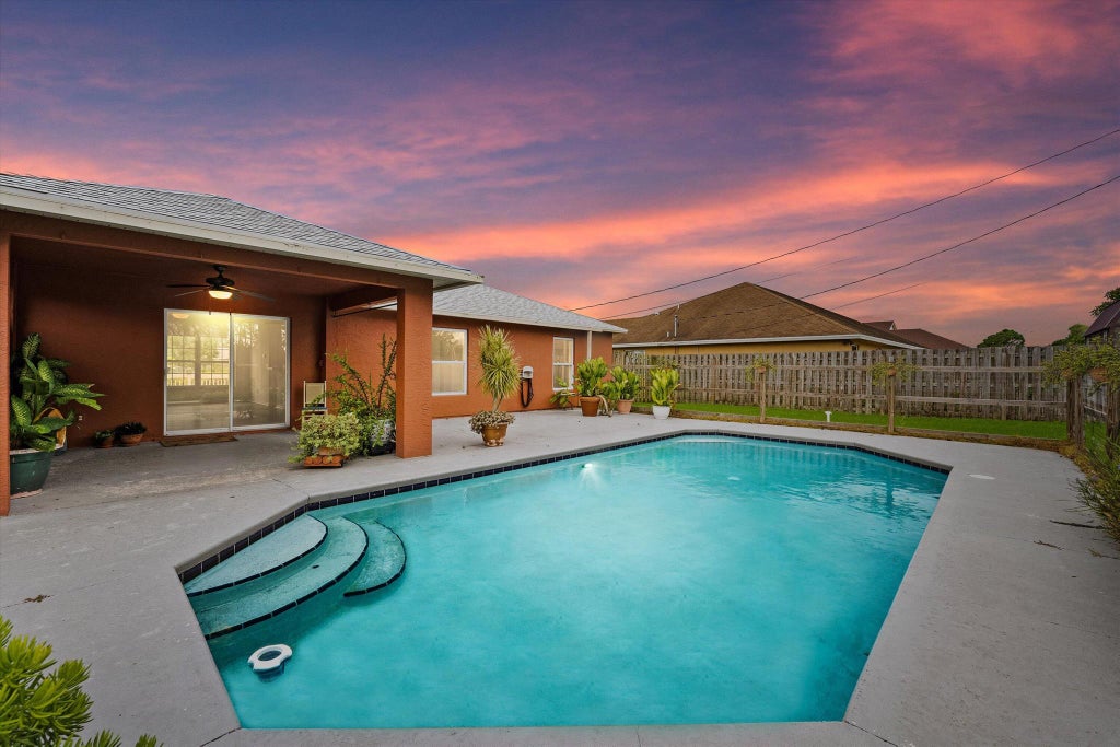 Photo of 2472 SW Page Circle, Port Saint Lucie, FL 34953 (MLS # R11023943)