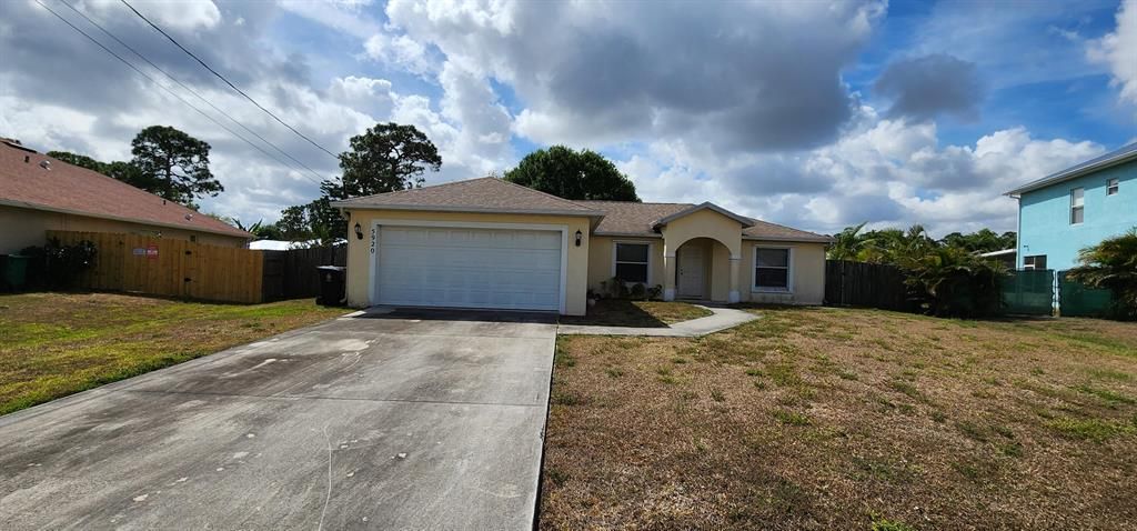 Photo of 5920 NW Wolverine Road, Port St Lucie, FL 34986 (MLS # R10882152)