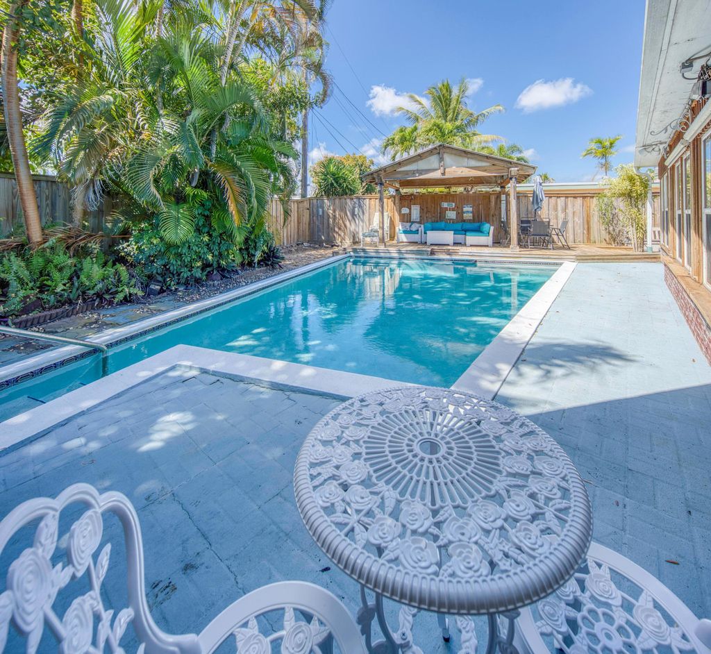 Photo of 1328 Lake Victoria Drive, Lake Worth Beach, FL 33461 (MLS # B26008664)